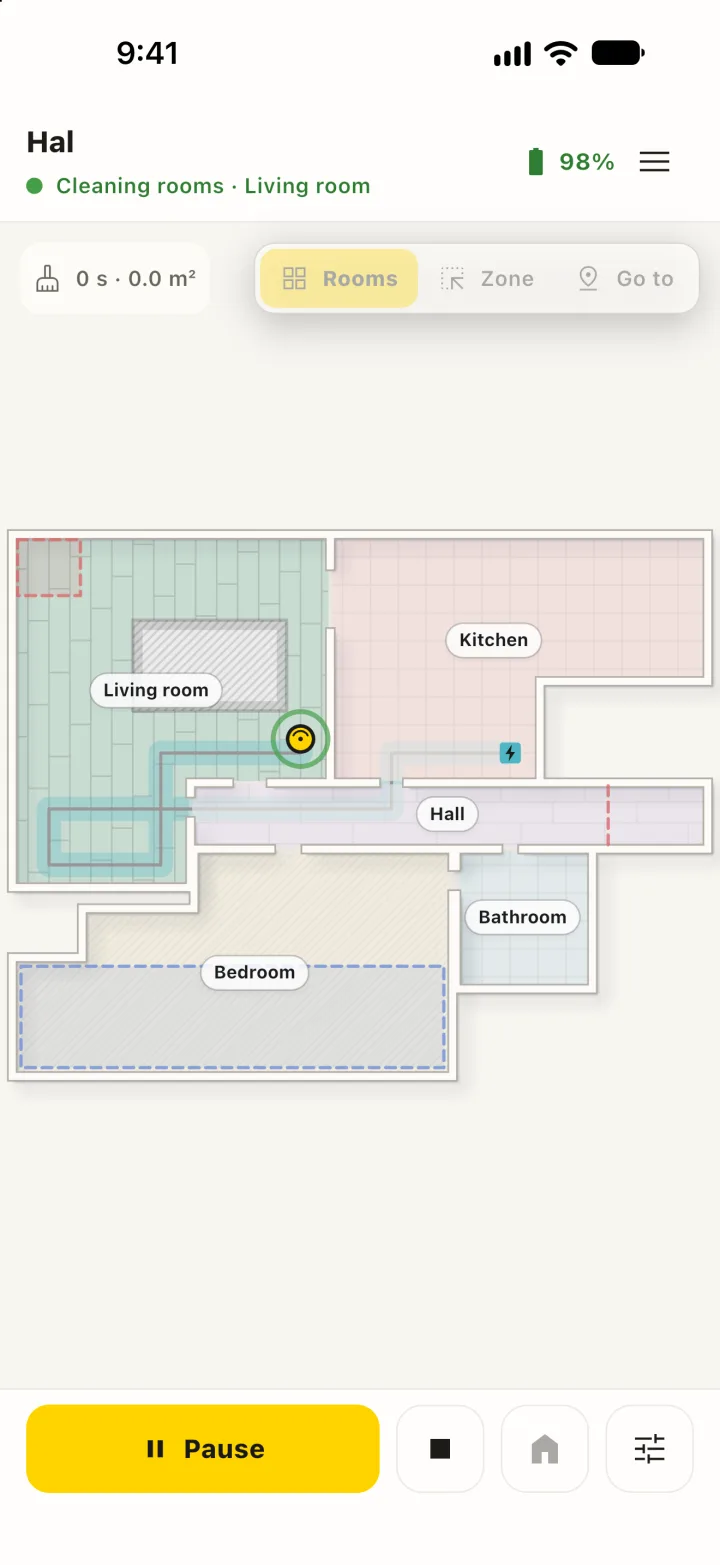 The RoboCommander home screen while the robot cleans the living room.